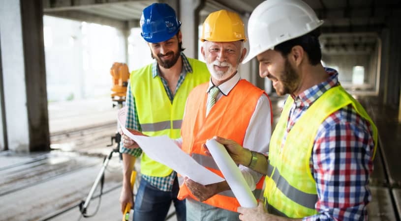 Architect and foreman talking on site