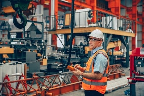 person operating overhead crane