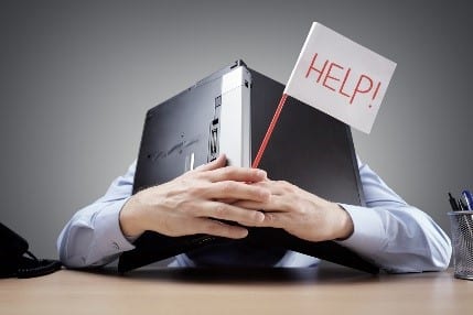 person with book over head and help sign