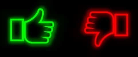 a green and red neon thumbs up signs